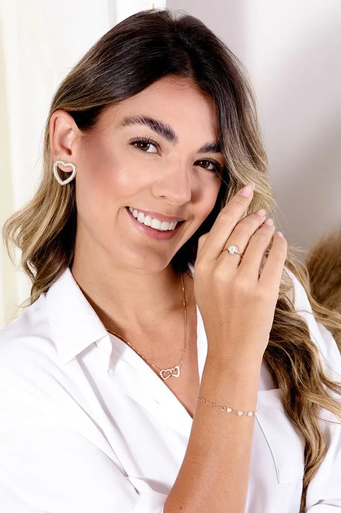BRINCO CORAÇÃO GRANDE VAZADO CRAVEJADO BANHADO A RÓDIO BRANCO