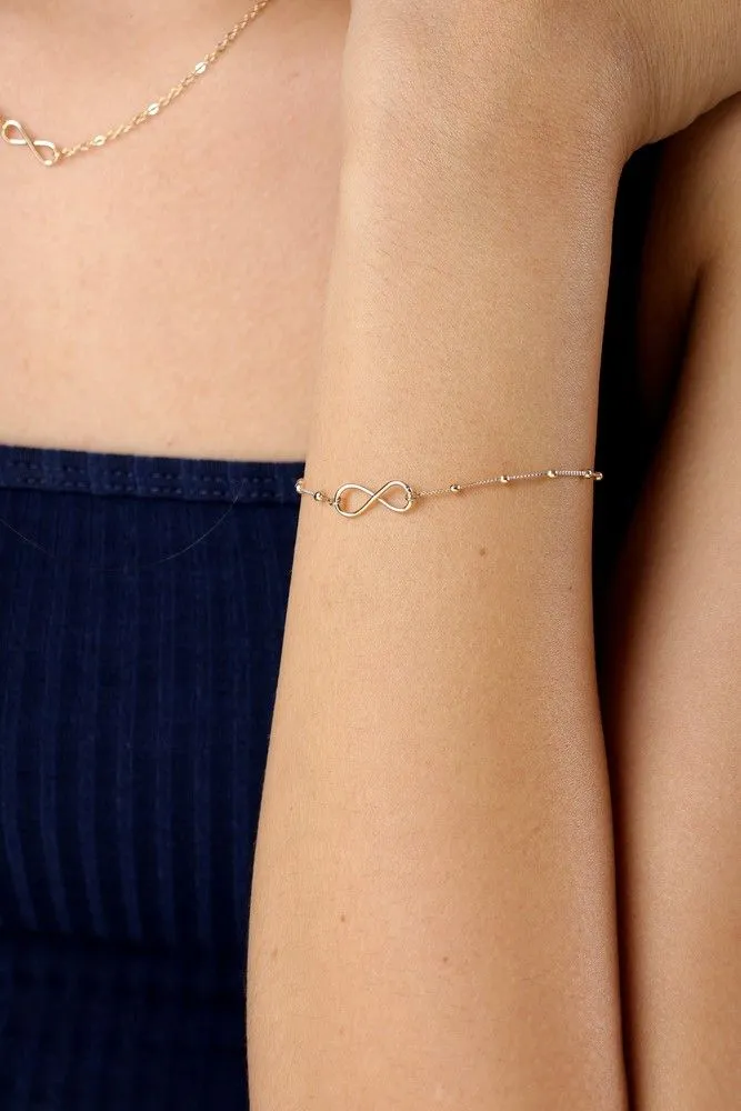 PULSEIRA INFINITO SILVA  BANHADA A OURO