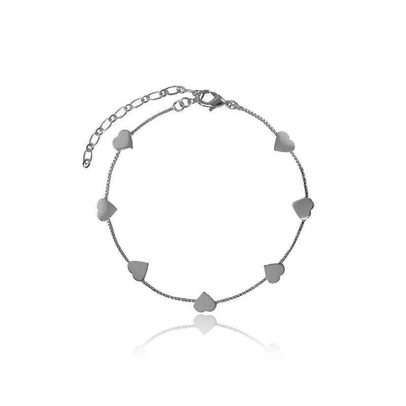 PULSEIRA COM CORAÇÕES LISOS - OURO